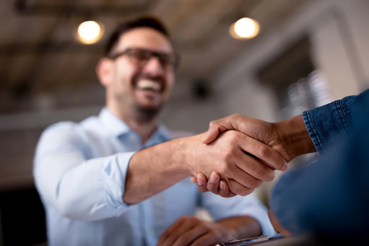 A property manager reviewing clear, transparent reporting with a rental owner
